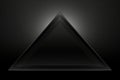 a black triangle on a dark background Royalty Free Stock Photo