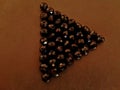 Black triangular beads Royalty Free Stock Photo