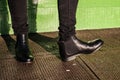 Black trousers and ladies vintage boots Royalty Free Stock Photo