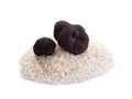 Black truffle over raw rice on Royalty Free Stock Photo