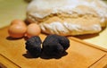 black truffles on a chopping board Royalty Free Stock Photo