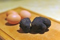 black truffles on a chopping board Royalty Free Stock Photo