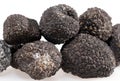 Black truffles isolated on a white background. Royalty Free Stock Photo