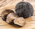 Black truffles on the old wooden table Royalty Free Stock Photo