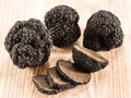 Black truffles on the old wooden table Royalty Free Stock Photo