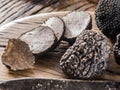 Black truffles on the old wooden table Royalty Free Stock Photo