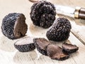 Black truffles on the old wooden table Royalty Free Stock Photo