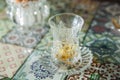 Tea in Azerbaijani traditional armudu pear-shaped glass . Azerbaijan black tea .white sugar cubes . Black turkish tea in pear Royalty Free Stock Photo