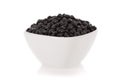 Black turtle beans in a bowl isolated on white Royalty Free Stock Photo