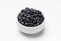 Black turtle beans bowl on white background