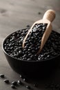 Black turtle beans legumes in bowl Royalty Free Stock Photo