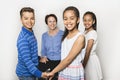 Black twin girls and boy child with grandmother in studio white background