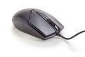 Black typical cabled computer mouse on a matte surface closeup Royalty Free Stock Photo