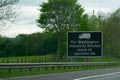 Black UK Road Sign Directing Drivers Off The A1 And On To Washington Industrial Estate In The North East England, Near Nissan Car