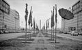 Black umbrella flying along the street Royalty Free Stock Photo