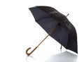 Black umbrella on a white background