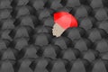 Black umbrellas with person red umbrella individuality, uniqueness. Royalty Free Stock Photo