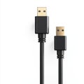 A black USB cable featuring a gold connector for highspeed data transfer and charging capabilities Royalty Free Stock Photo