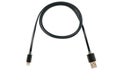 Black usb cable for iPhone or iPad. Twisted in a ring, on a white isolated background. Horizontal frame Royalty Free Stock Photo