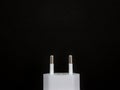 Black USB charger head/adapter in black isolated background