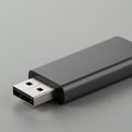 A black USB flash drive with a sleek, rectangular body and a metal connector. Royalty Free Stock Photo