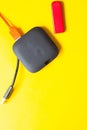 Black USB HUB with usb stick flash drives on yellow background. Top view Royalty Free Stock Photo