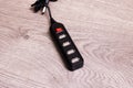 Black USB hub on a wooden background Royalty Free Stock Photo