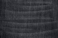 Black used jeans with folds in white Royalty Free Stock Photo