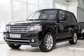 Black used Land Rover Range Rover Supercharger 2010 with front view on the car snow parking after preparing for sale