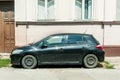 Black used Toyota Auris car parked on the street.