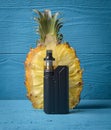 Black vaporizer and pineapple