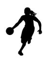 Black figure of a women's basketball girl player who runs forward bending over dribbling the ball and attack Royalty Free Stock Photo