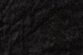 Black velvet textured fabric material background Royalty Free Stock Photo