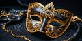 Black Venetian mask with gold decorations on a glittery background Royalty Free Stock Photo