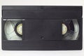 Black VHS video tape cassette with blank label isolated on white background Royalty Free Stock Photo