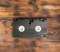 black videotape on a wooden background. copy space.