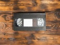 black videotape on a wooden background. copy space.