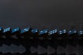 Black vintage falling dominoes on a black background, selective focus Royalty Free Stock Photo