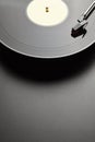 Black vinyl record player on black table background Royalty Free Stock Photo