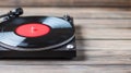 Black Vinyl Record Player on Wooden Surface Royalty Free Stock Photo