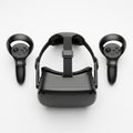 Black virtual reality headset and two controllers placed on a white Royalty Free Stock Photo