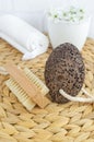 Black volcanic pumice stone and massage foot brush with natural bristles. Homemade spa and diy pedicure concept Royalty Free Stock Photo