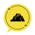 Black Volcano eruption with lava icon isolated on white background. Yellow speech bubble symbol. Vector