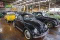 A black 1956 Volkswagen Beetle at Lane Motor Museum with the largest collection of vintage European cars, motorcycles and bicycles