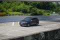 Black Volkswagen Tiguan All Space driving fast on trans jawa highway