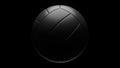 Black volleyball ball isolated on black background.