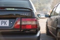 Black Volvo 850 T-5R parked on the street