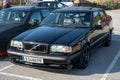 Black Volvo 850 T-5R parked on the street