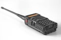 Black walkie talkie with a red call button on white background. portable two-way radio Royalty Free Stock Photo