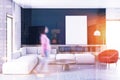 Black wall living room, white sofa, poster blur Royalty Free Stock Photo